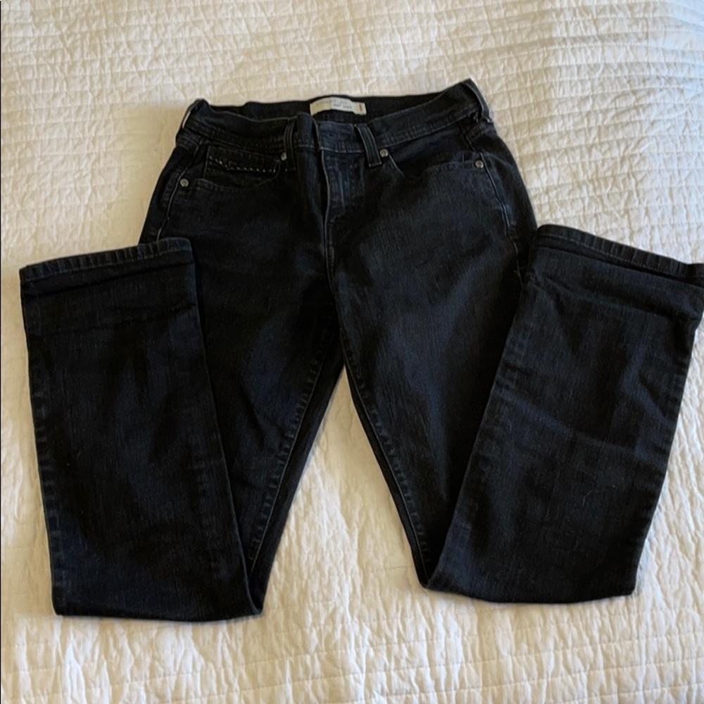 Faded black Levi 505 jeans.